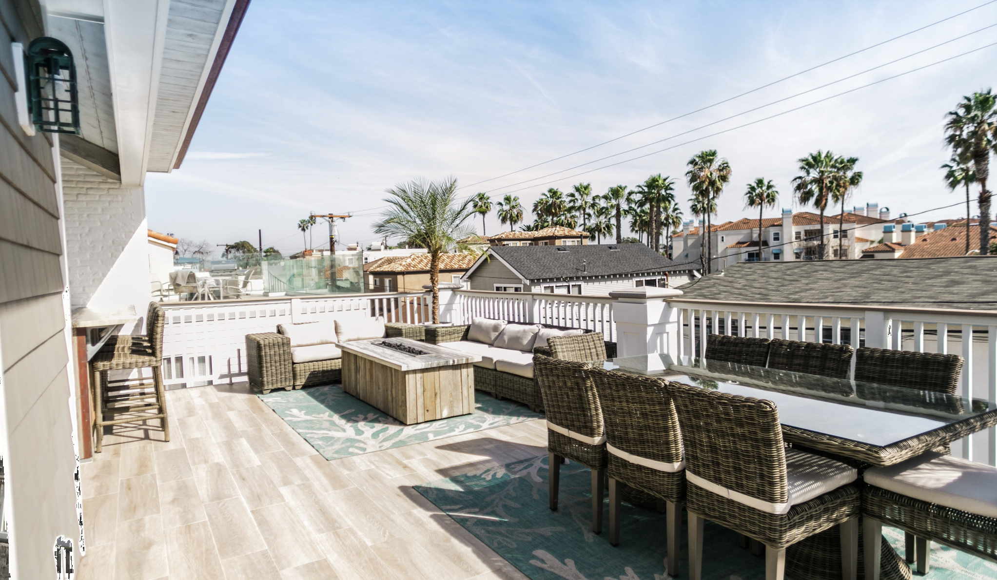 Rooftop back deck with fire pit and dining